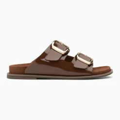 Mules plates Célia marron verni à boucles oversize