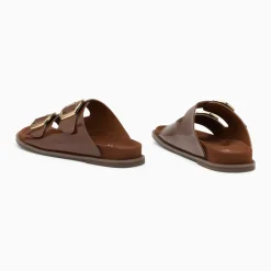 Mules plates Célia marron verni à boucles oversize