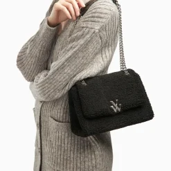 Sac à main Ophra noir en fausse fourrure et à chaîne