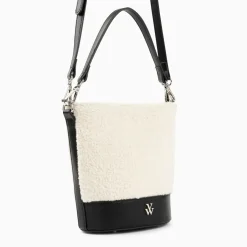 Sac seau Milou ivoire et noir en faux shearling