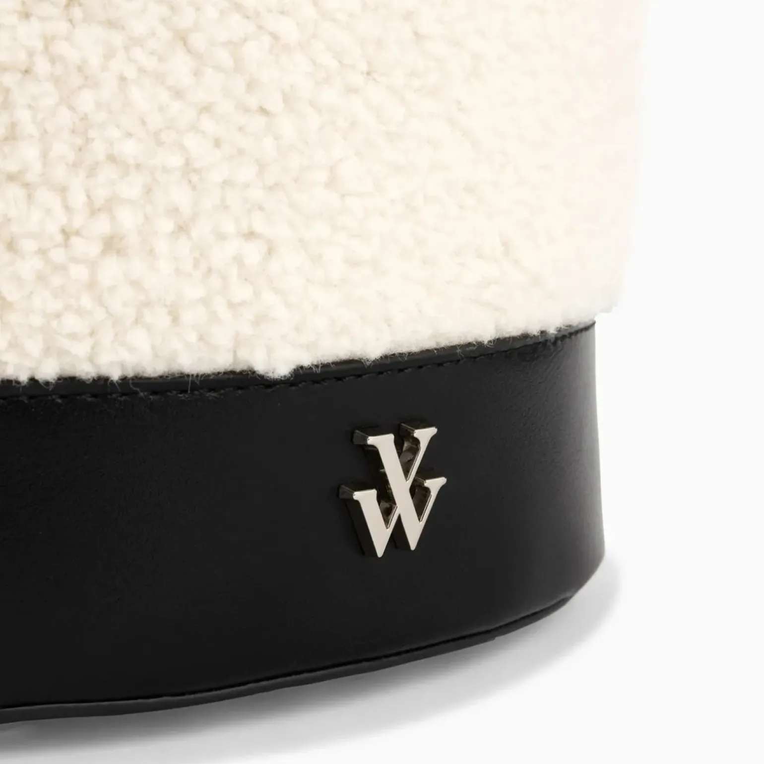 Sac seau Milou ivoire et noir en faux shearling